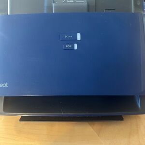 Blue Scanner with box . Cords included.